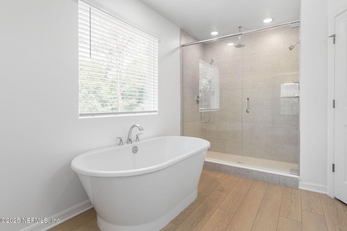 Bathroom, Free Standing Baths, Glass Shower, Interior, Recessed Lighting, Wood Texture Flooring