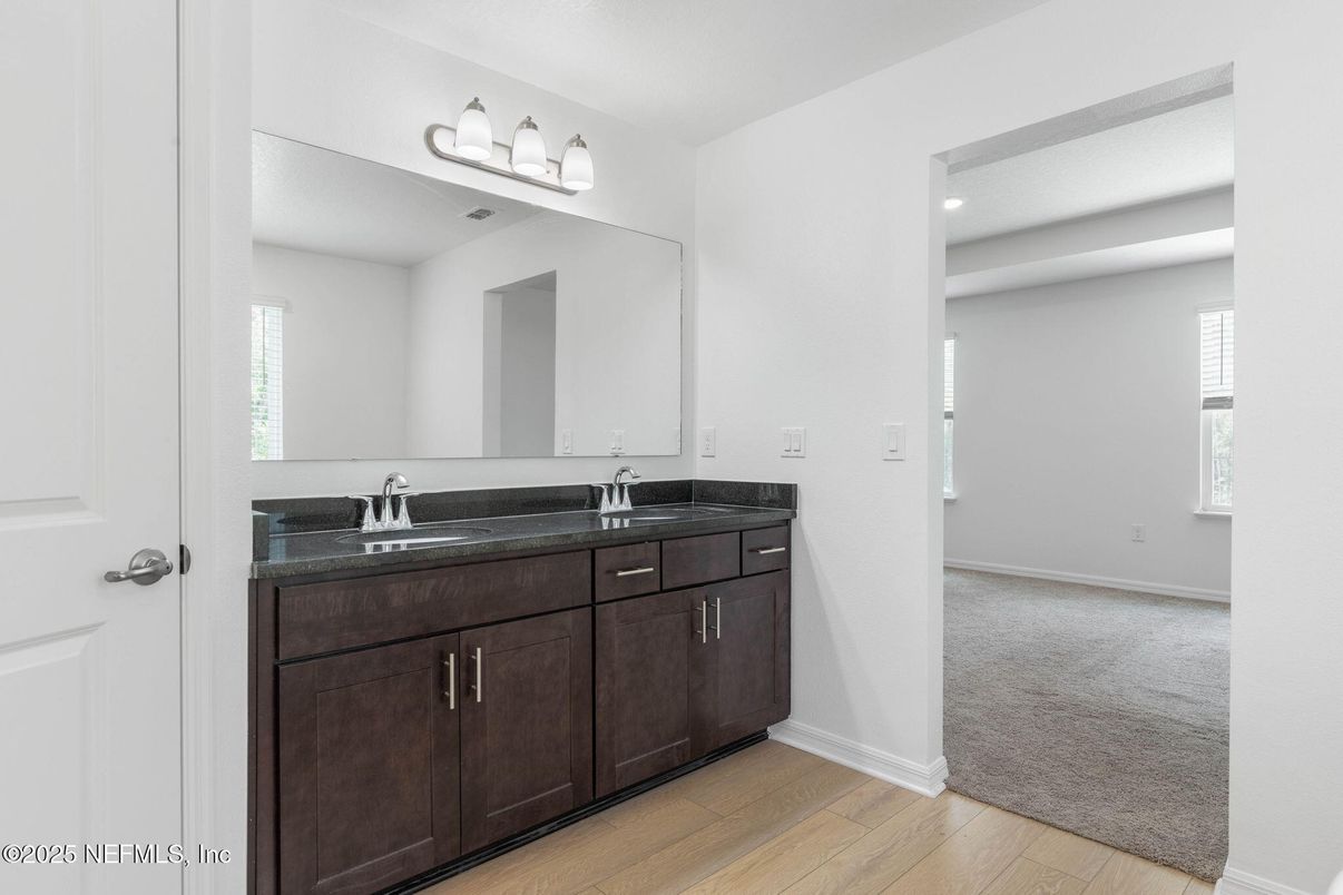 Bathroom, Dual Sink Vanities, Interior, Recessed Lighting, Wood Texture Flooring