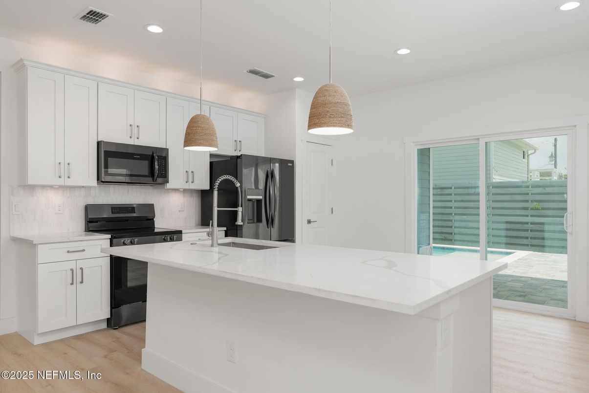 Interior, Kitchen, Pendant Lights, Recessed Lighting, Stainless Steel Appliances, Wood Texture Flooring