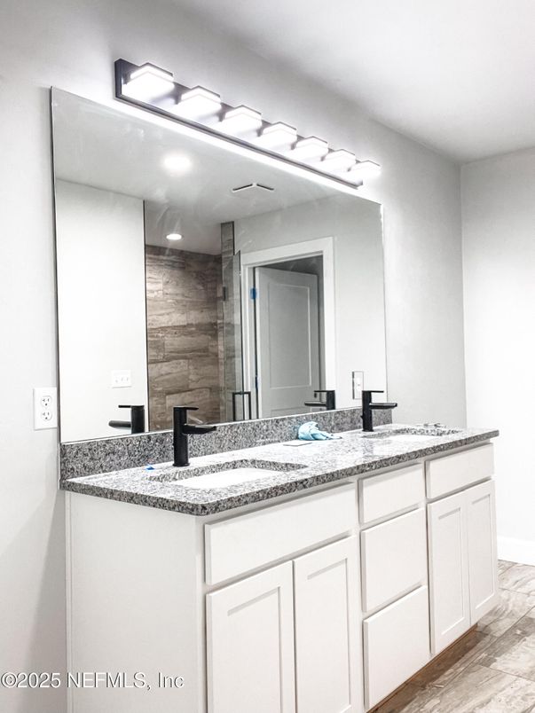 Bathroom, Dual Sink Vanities, Glass Shower, Interior, Wood Texture Flooring
