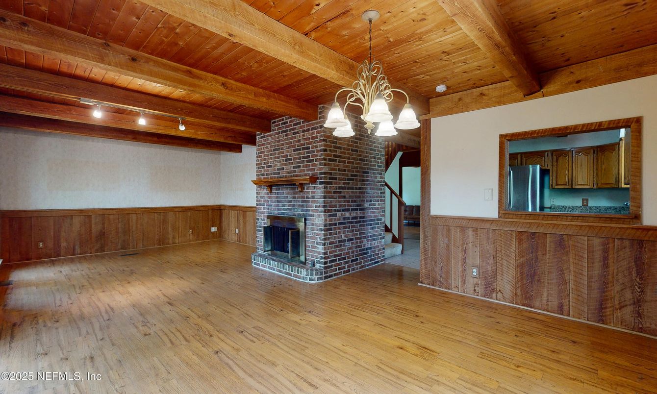 Chandelier, Empty room, Fireplace, Interior, Stone Walls, Wooden Beams, Wooden Ceilings, Wood Texture Flooring