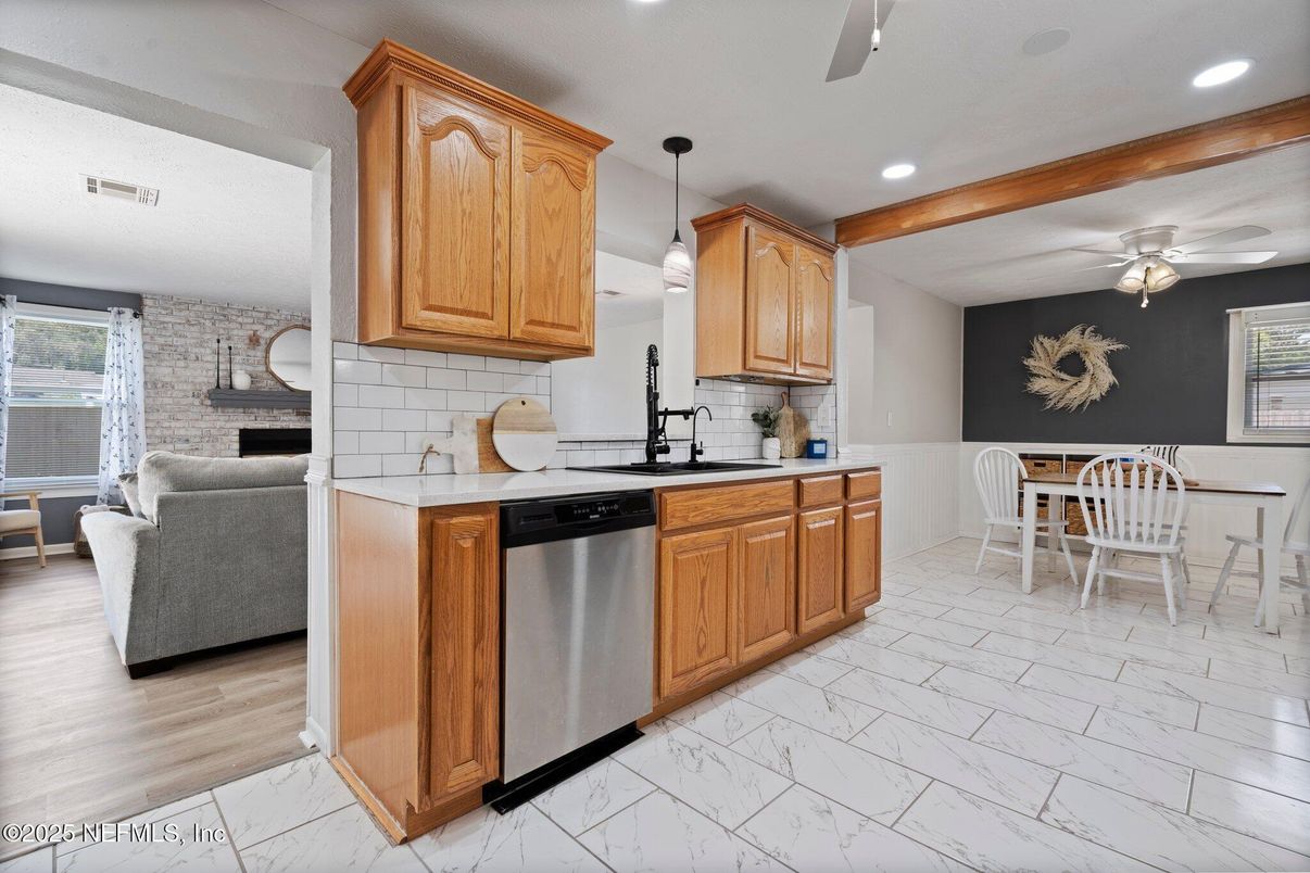 Dining room, Interior, Kitchen, Living room, Marble, Pendant Lights, Recessed Lighting, Stainless Steel Appliances, Stone Walls