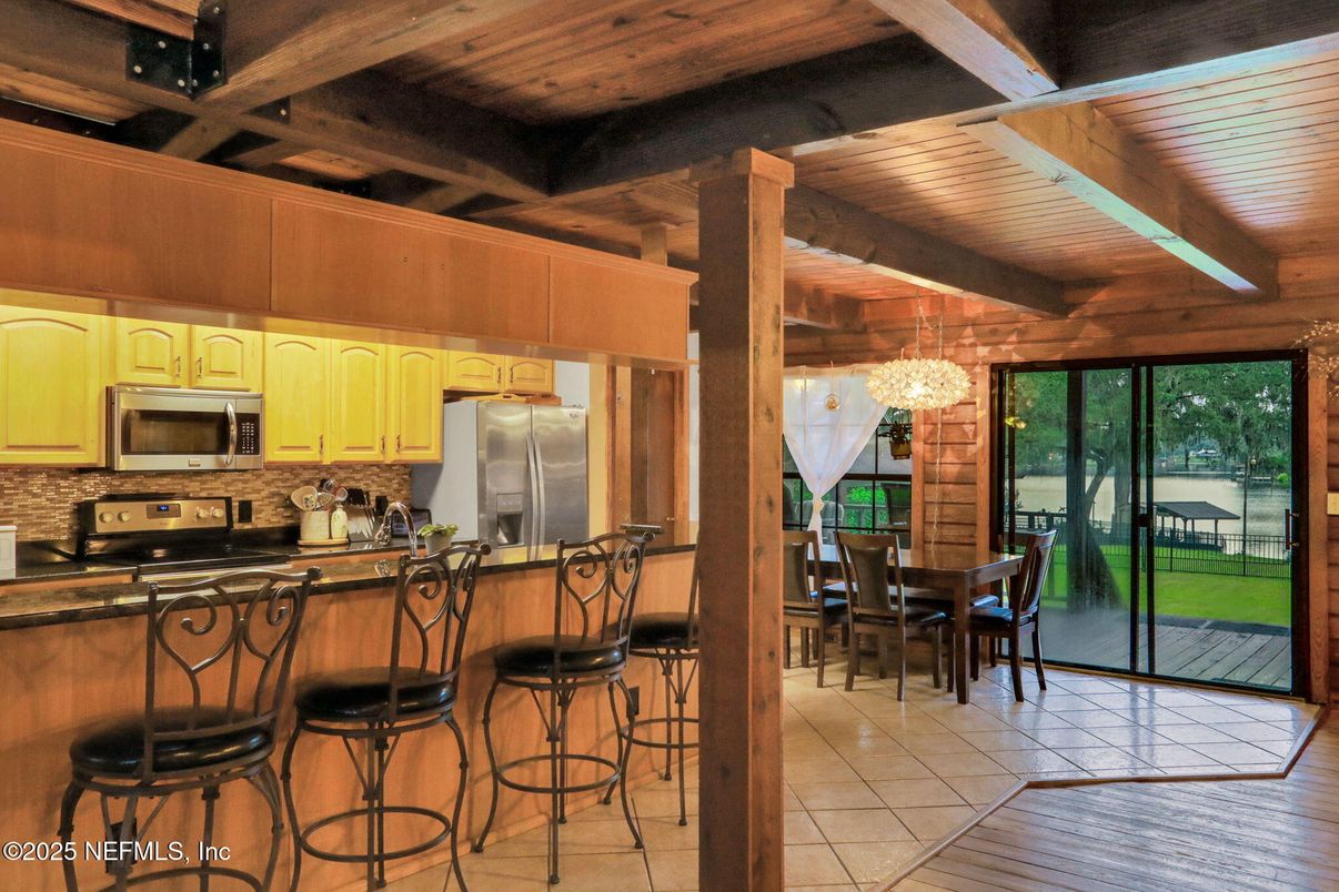 Chandelier, Dining room, Interior, Kitchen, Stainless Steel Appliances, Wooden Beams, Wooden Ceilings, Wood Texture Flooring