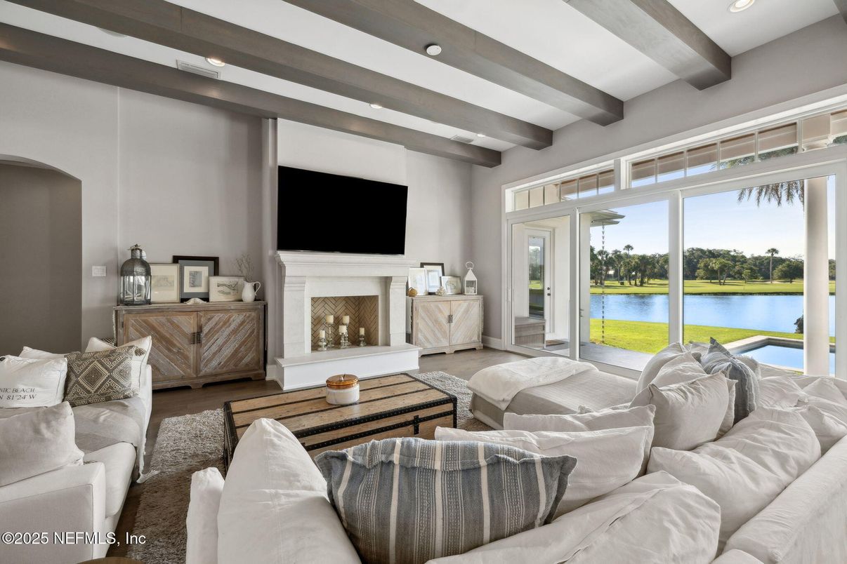 Fireplace, Interior, Living room, Recessed Lighting, Water, Wooden Beams
