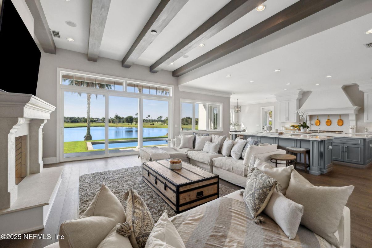 Fireplace, Interior, Kitchen, Living room, Pendant Lights, Recessed Lighting, Water, Wooden Beams, Wood Texture Flooring