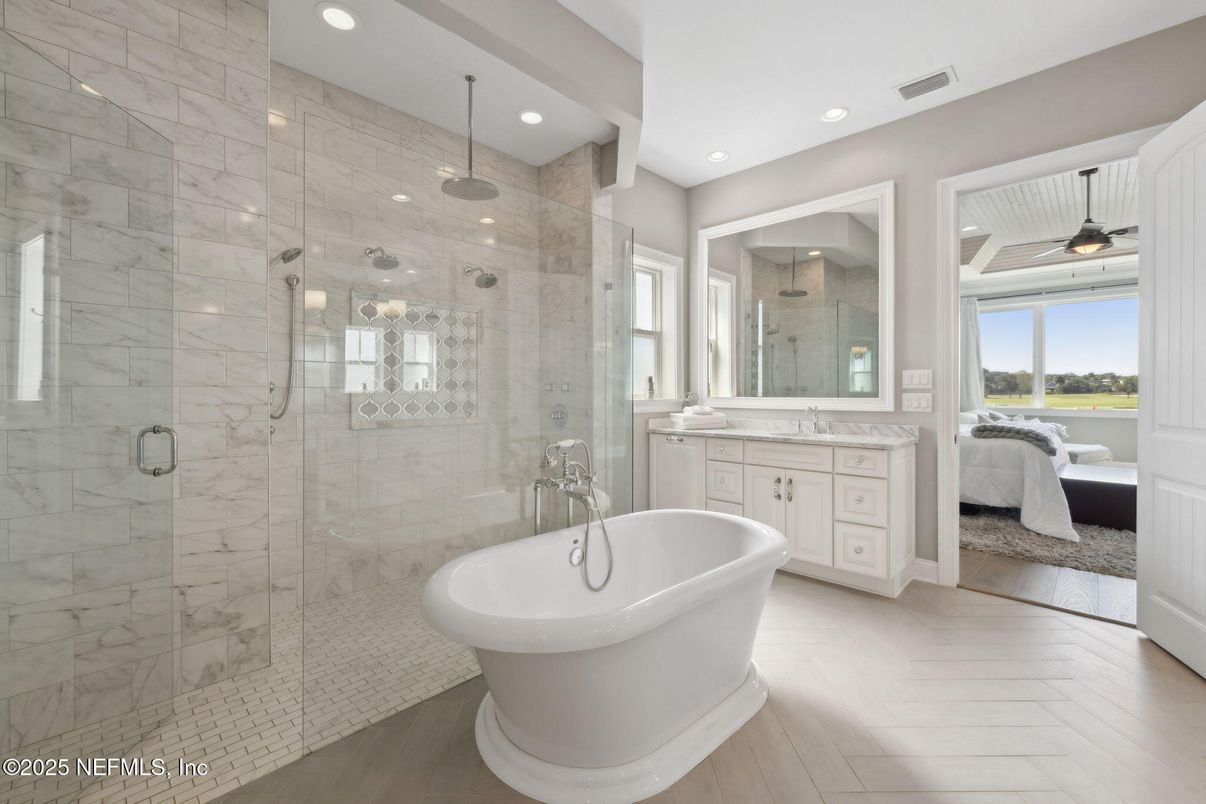 Bathroom, Bedroom, Dual Sink Vanities, Free Standing Baths, Glass Shower, Interior, Living room, Marble Walls, Recessed Lighting, Wood Texture Flooring
