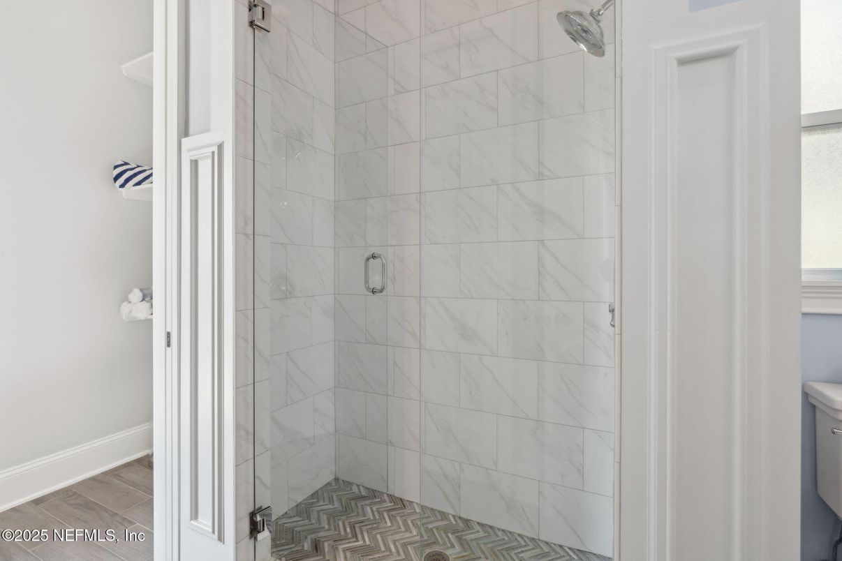 Bathroom, Glass Shower, Interior, Marble Walls, Wood Texture Flooring