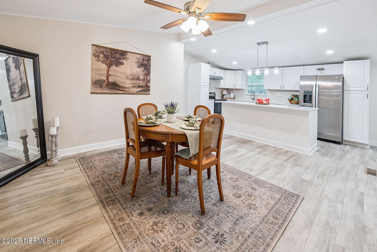 Dining room, Interior, Kitchen, Pendant Lights, Recessed Lighting, Stainless Steel Appliances, Wood Texture Flooring