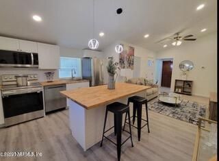 Interior, Kitchen, Living room, Pendant Lights, Recessed Lighting, Stainless Steel Appliances, Wood Texture Flooring