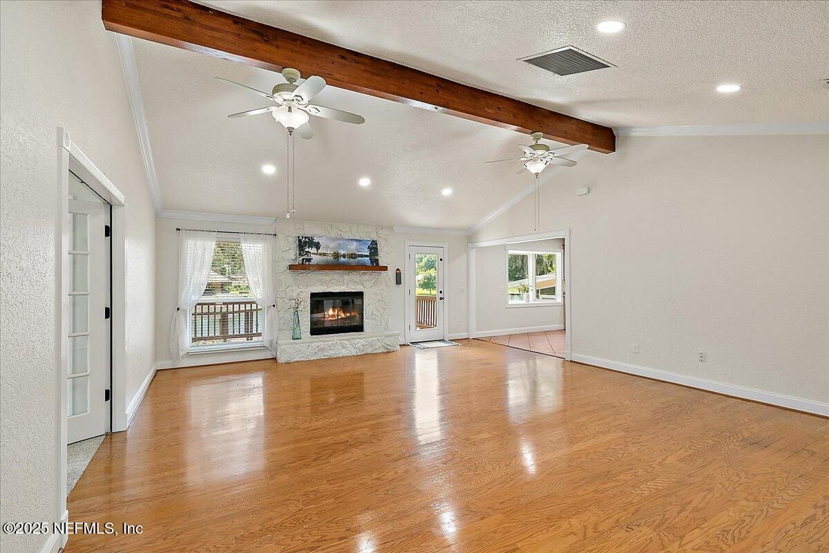 Empty room, Fireplace, Interior, Recessed Lighting, Wooden Beams, Wood Texture Flooring
