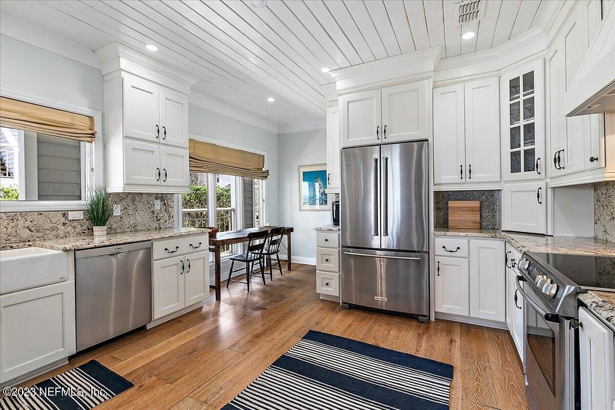 Dining room, Interior, Kitchen, Recessed Lighting, Stainless Steel Appliances, Wood Texture Flooring