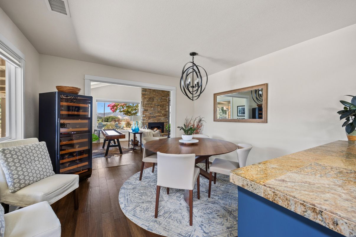 Dining room, Fireplace, Interior, Pendant Lights, Stone Walls, Wood Texture Flooring