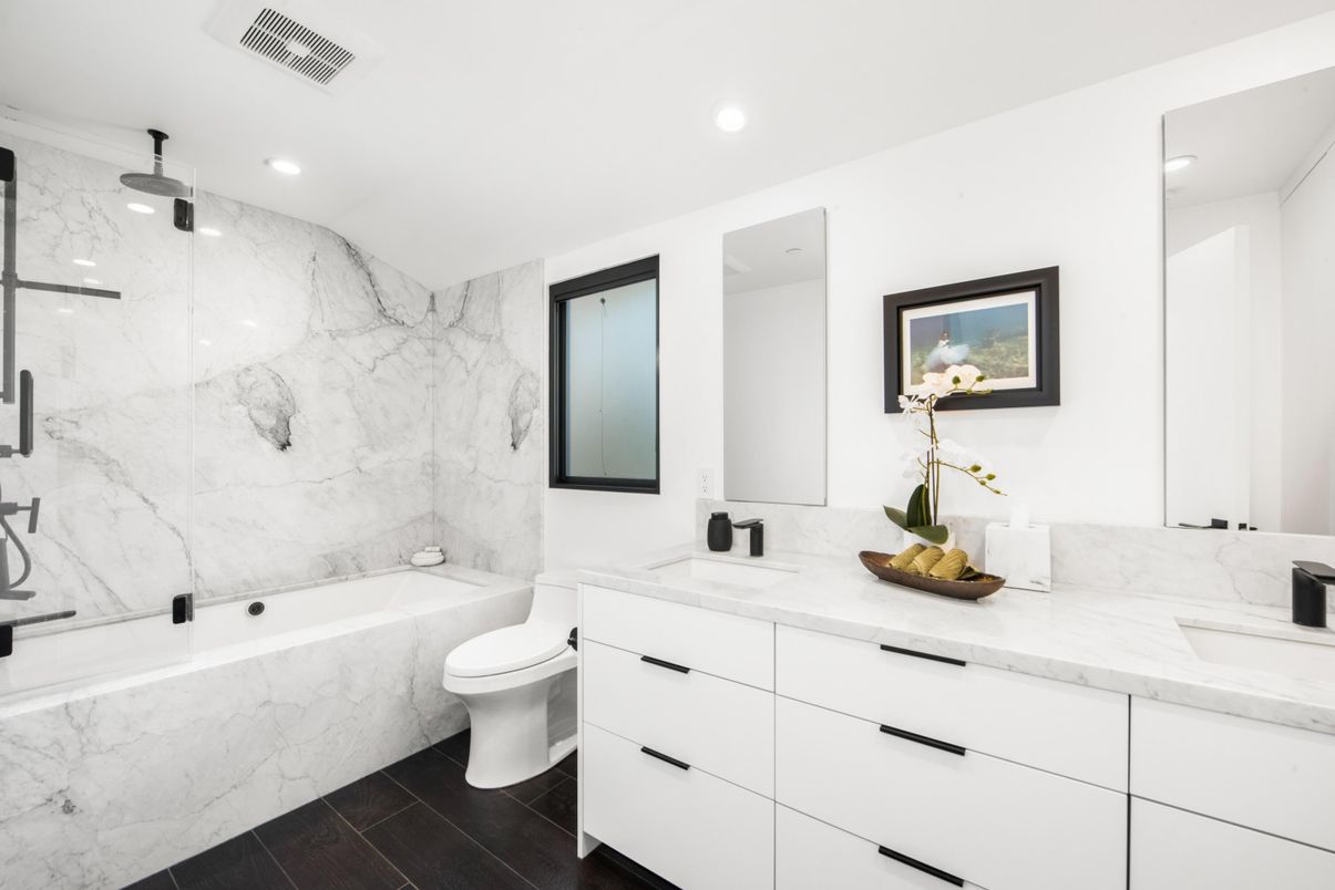Bathroom, Dual Sink Vanities, Glass Shower, Interior, Marble Walls, Recessed Lighting