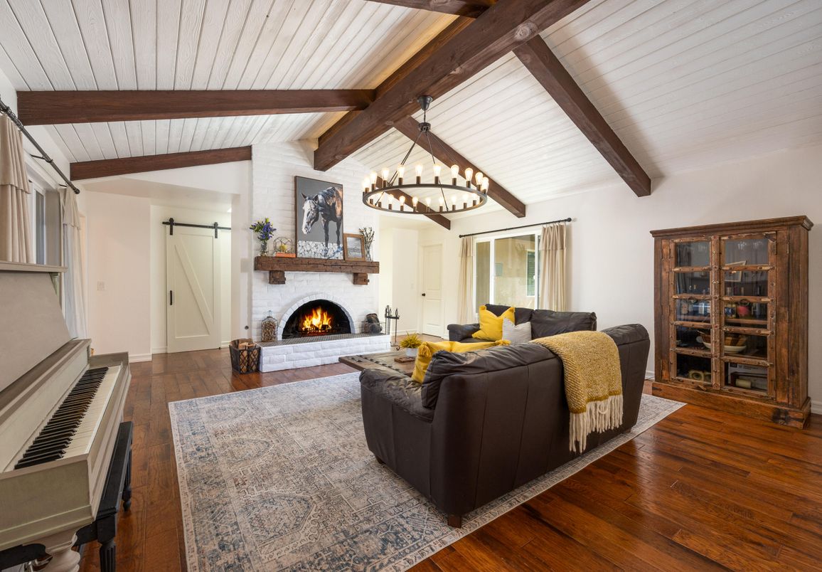 Chandelier, Fireplace, Interior, Living room, Piano, Wooden Beams, Wood Texture Flooring