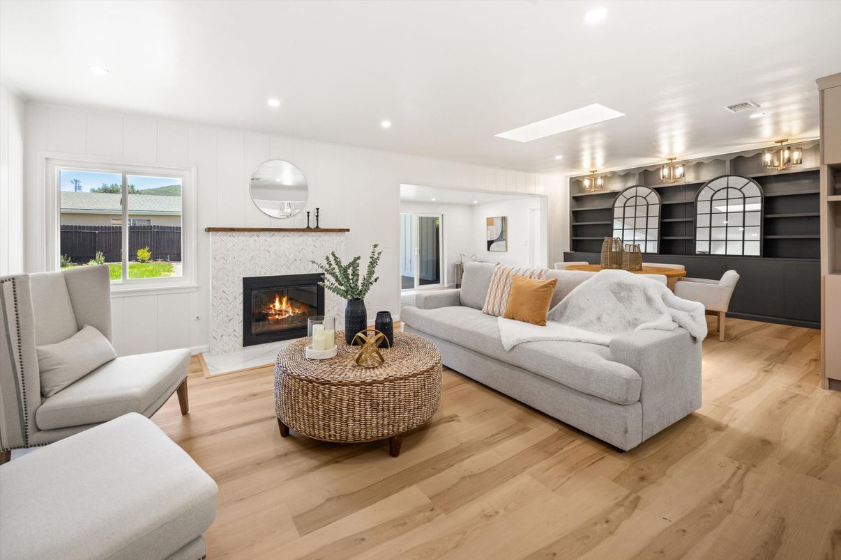 Dining room, Fireplace, Interior, Living room, Recessed Lighting, Wood Texture Flooring