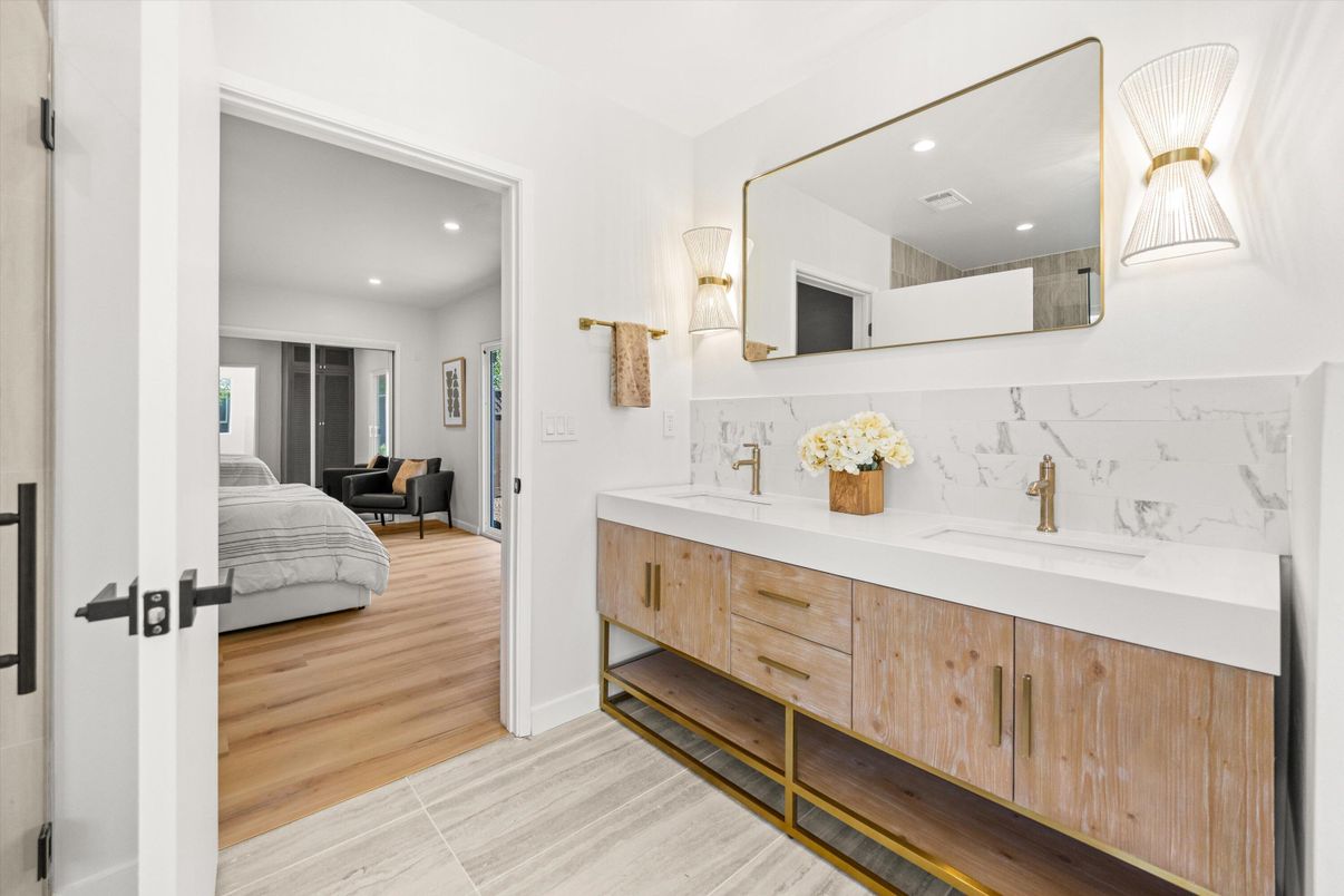 Bathroom, Bedroom, Dual Sink Vanities, Interior, Marble Walls, Recessed Lighting, Wood Texture Flooring