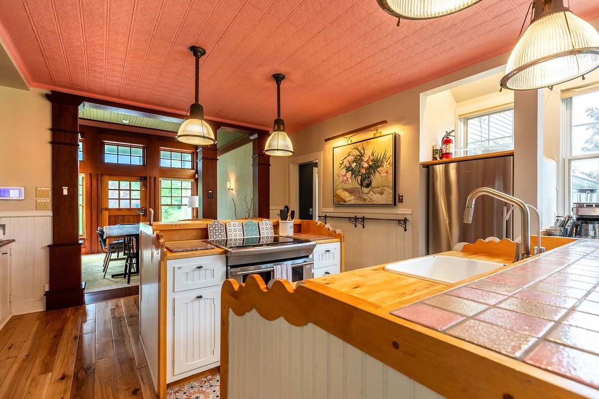 Interior, Kitchen, Pendant Lights, Tile Countertops, Wood Texture Flooring