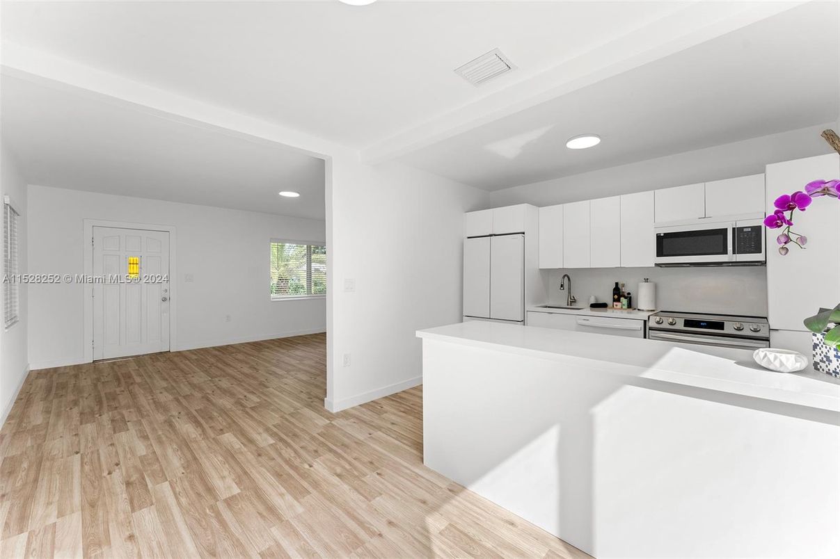 Interior, Kitchen, Recessed Lighting, Stainless Steel Appliances, Wood Texture Flooring