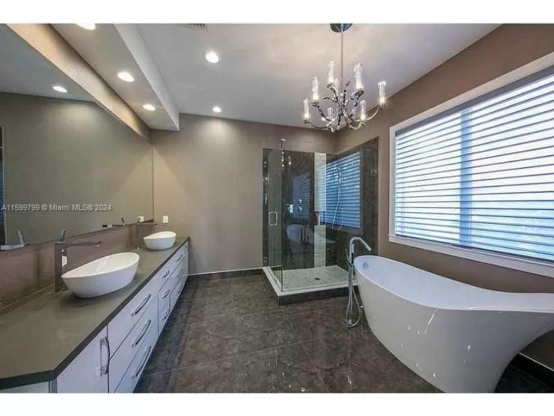 Bathroom, Chandelier, Dual Sink Vanities, Free Standing Baths, Glass Shower, Interior, Recessed Lighting