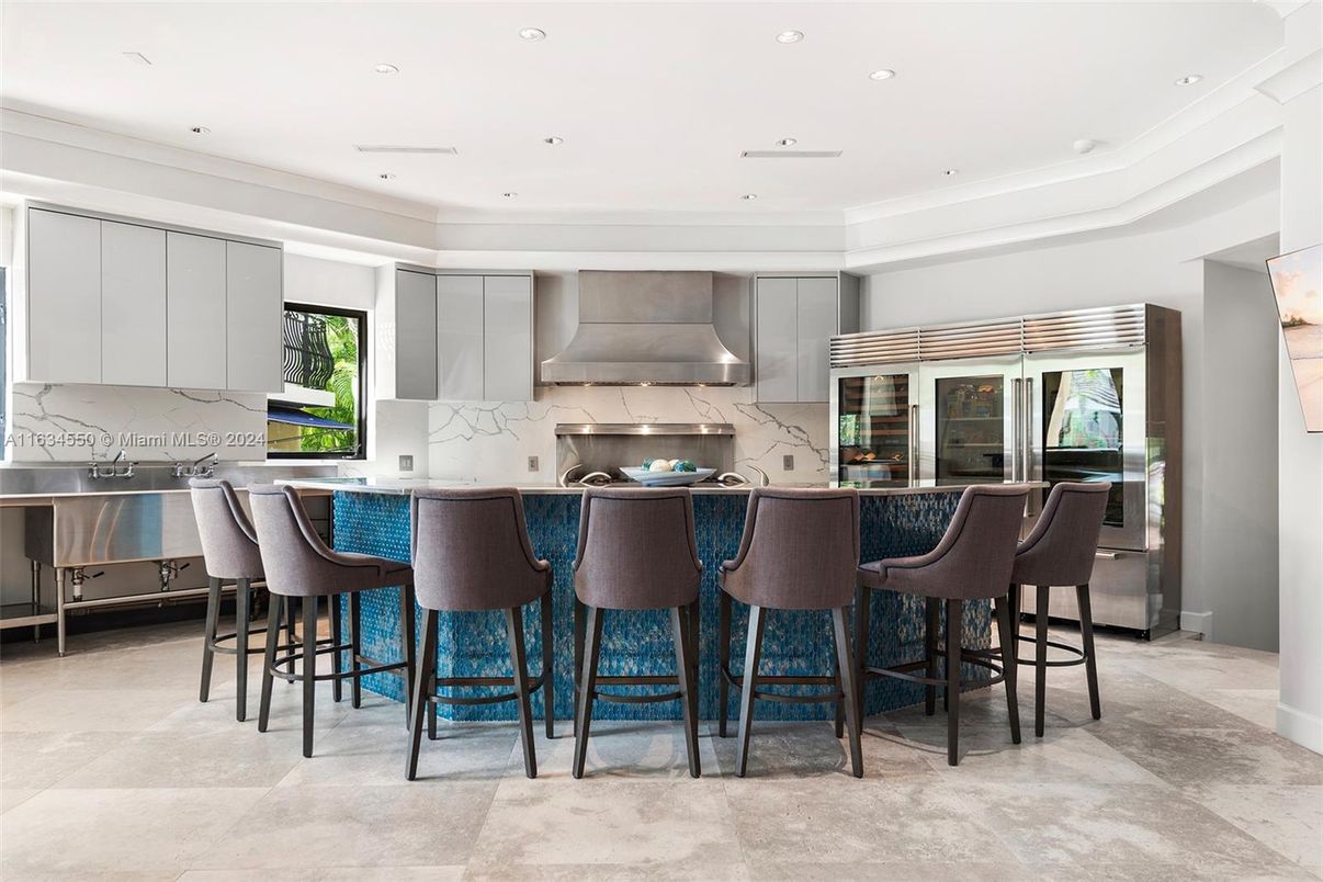 Interior, Kitchen, Marble Walls, Recessed Lighting, Stainless Steel Appliances