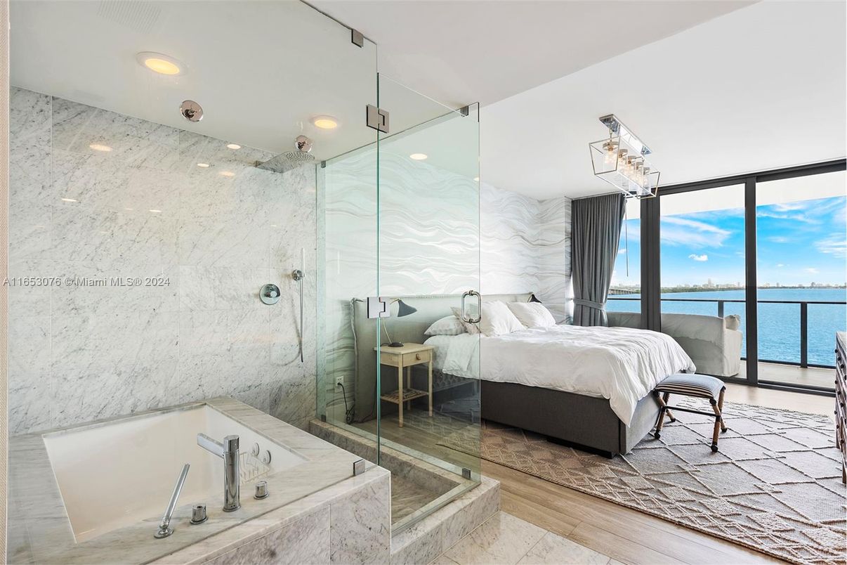 Bathroom, Bedroom, Glass Shower, Interior, Marble Walls, Recessed Lighting, Water, Wood Texture Flooring