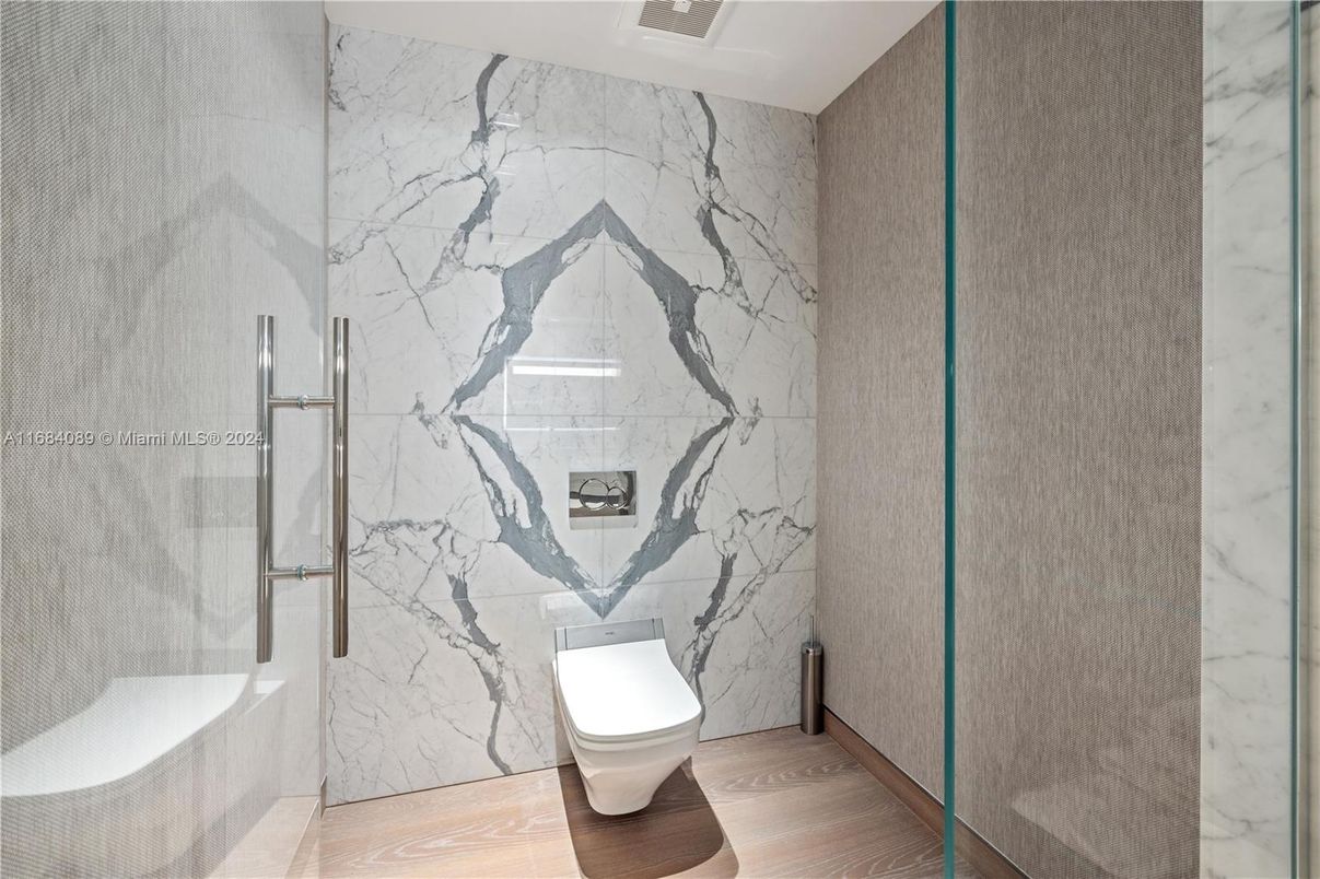 Bathroom, Glass Shower, Interior, Marble Walls, Wood Texture Flooring