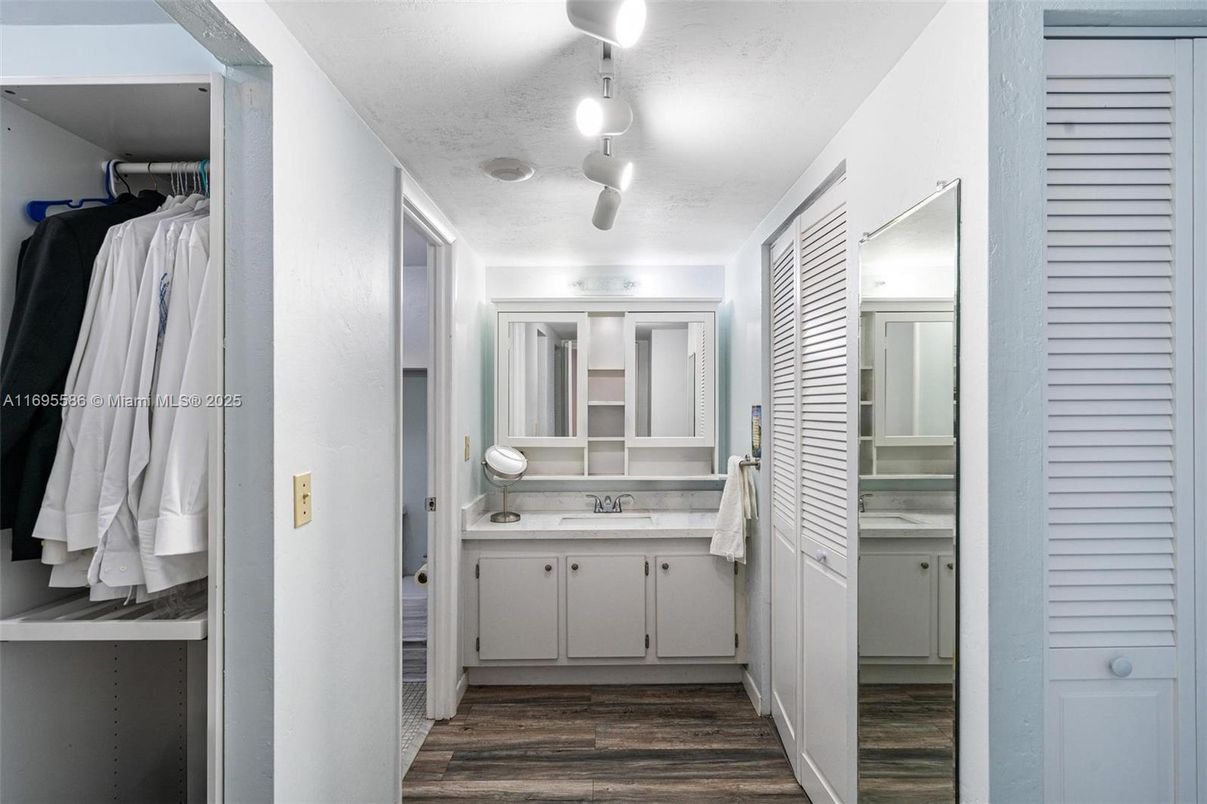 Bathroom, Dual Sink Vanities, Interior, Walk-in Closets, Wood Texture Flooring