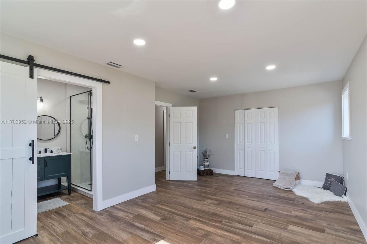 Bathroom, Empty room, Glass Shower, Interior, Recessed Lighting, Wood Texture Flooring