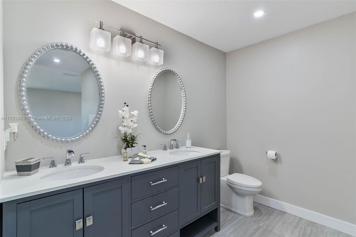 Bathroom, Dual Sink Vanities, Interior, Recessed Lighting, Wood Texture Flooring