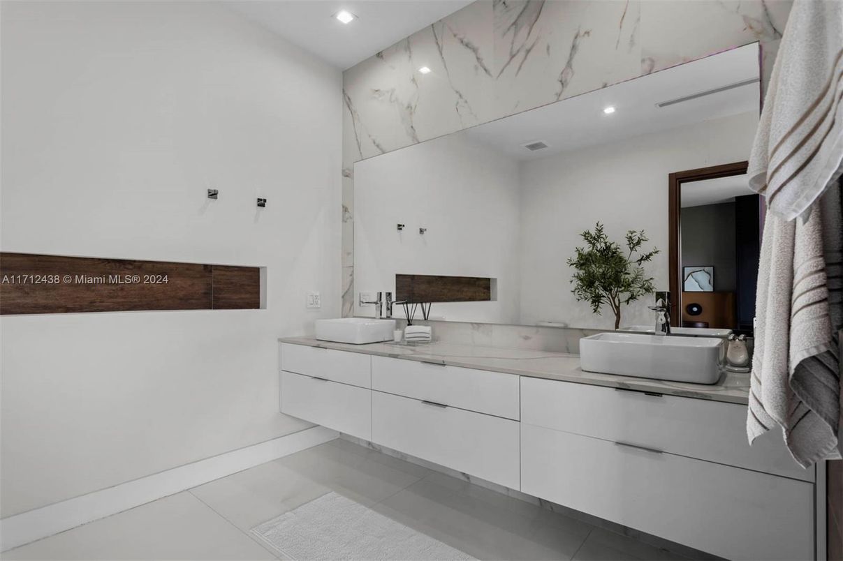 Bathroom, Dual Sink Vanities, Interior, Marble Walls, Recessed Lighting
