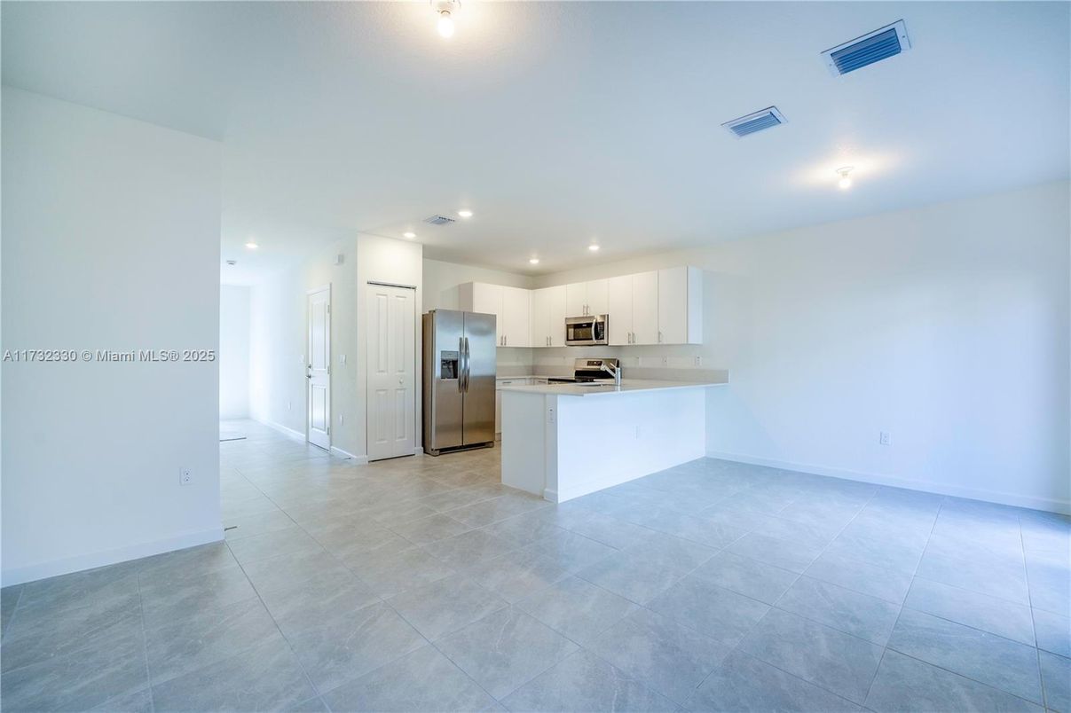 Empty room, Interior, Kitchen, Recessed Lighting, Stainless Steel Appliances