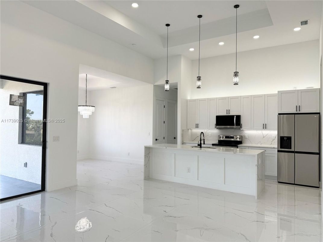 Interior, Kitchen, Marble, Pendant Lights, Recessed Lighting, Stainless Steel Appliances