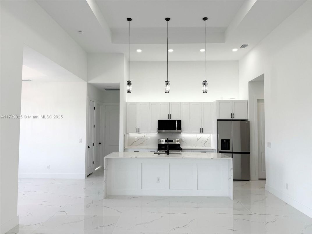 Interior, Kitchen, Marble, Pendant Lights, Recessed Lighting, Stainless Steel Appliances