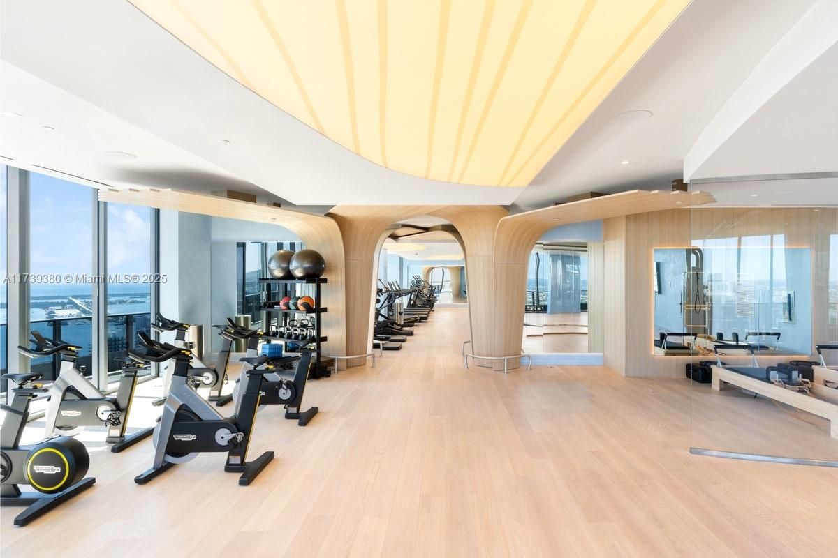 Fitness Equipment, Gym, Interior, Recessed Lighting, Water, Wood Texture Flooring