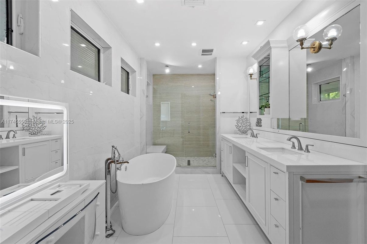 Bathroom, Dual Sink Vanities, Free Standing Baths, Glass Shower, Interior, Marble Walls, Recessed Lighting
