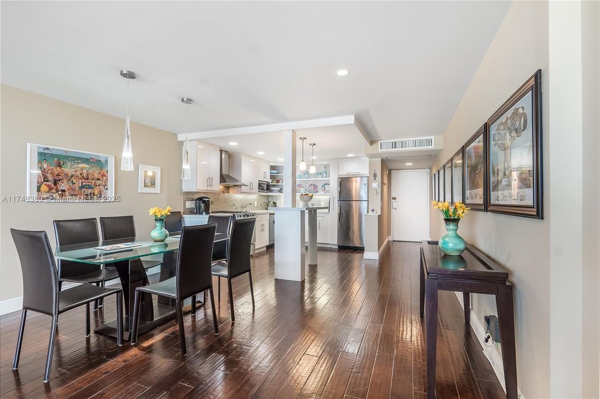 Dining room, Interior, Kitchen, Pendant Lights, Recessed Lighting, Stainless Steel Appliances, Wood Texture Flooring
