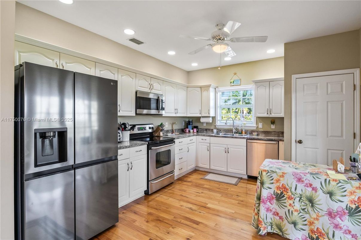 Interior, Kitchen, Recessed Lighting, Stainless Steel Appliances, Wood Texture Flooring