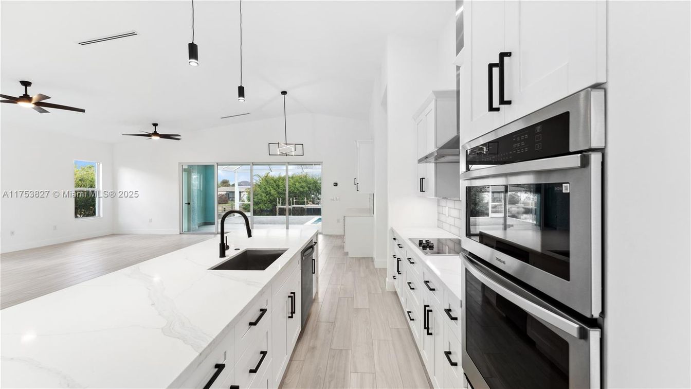 Interior, Kitchen, Pendant Lights, Stainless Steel Appliances, Wood Texture Flooring