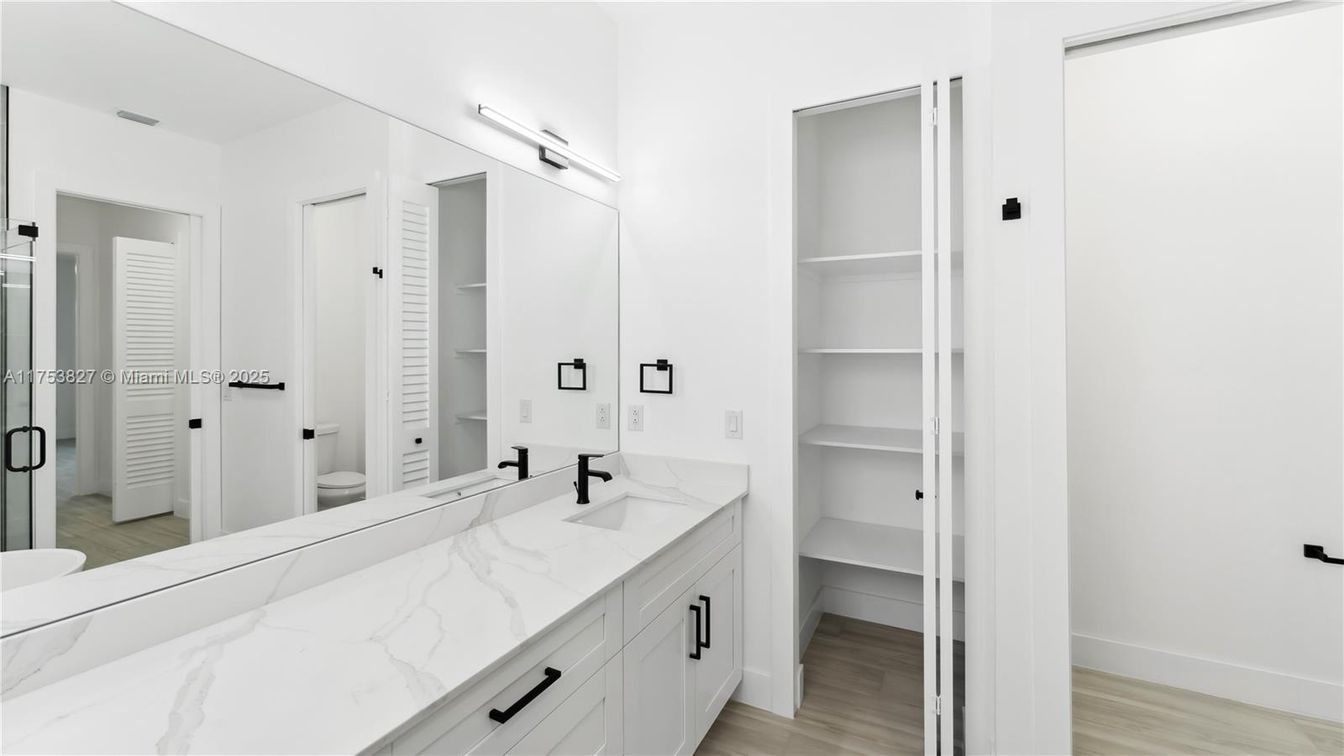 Bathroom, Dual Sink Vanities, Interior, Walk-in Closets, Wood Texture Flooring