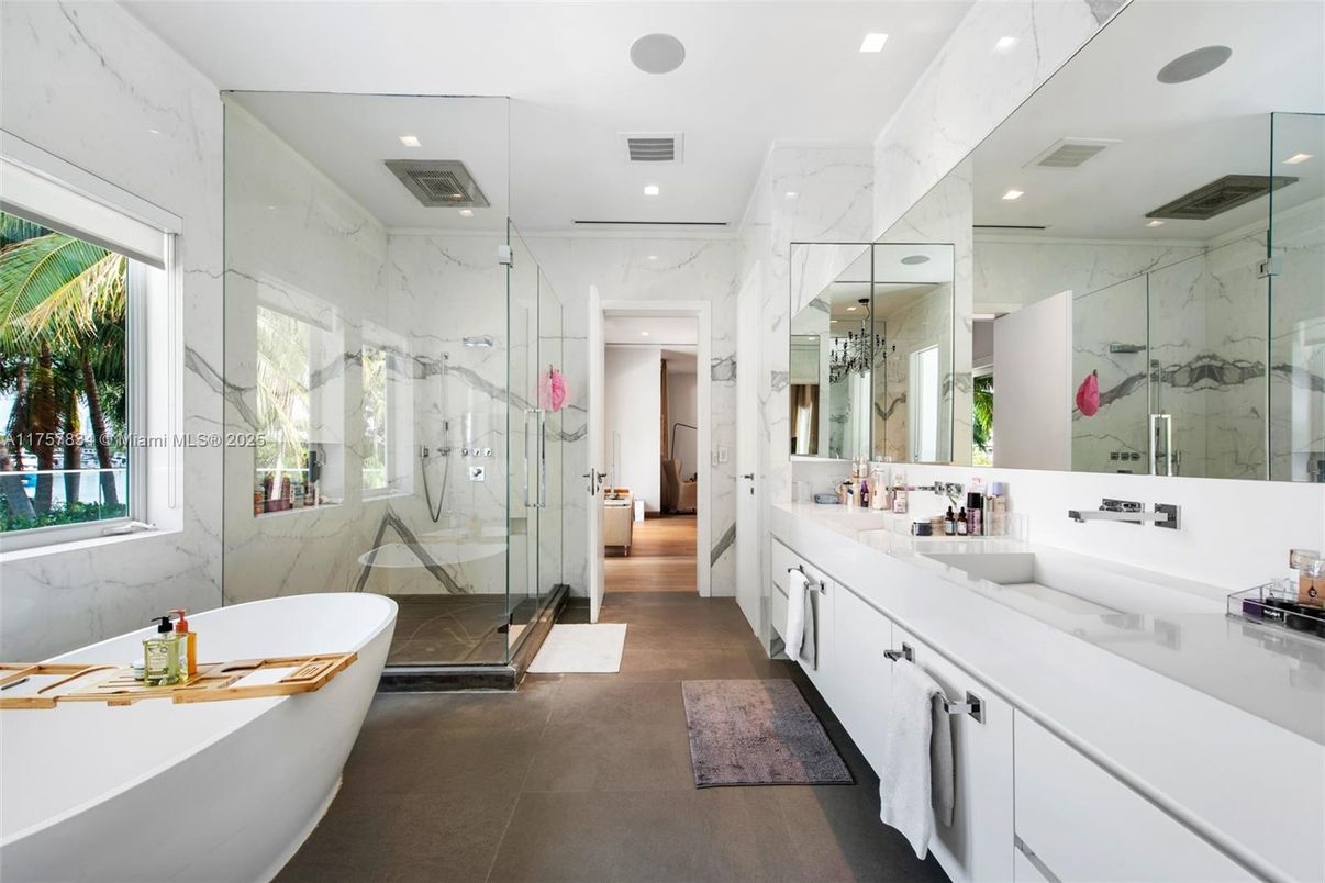 Bathroom, Dual Sink Vanities, Free Standing Baths, Glass Shower, Interior, Marble Walls, Recessed Lighting
