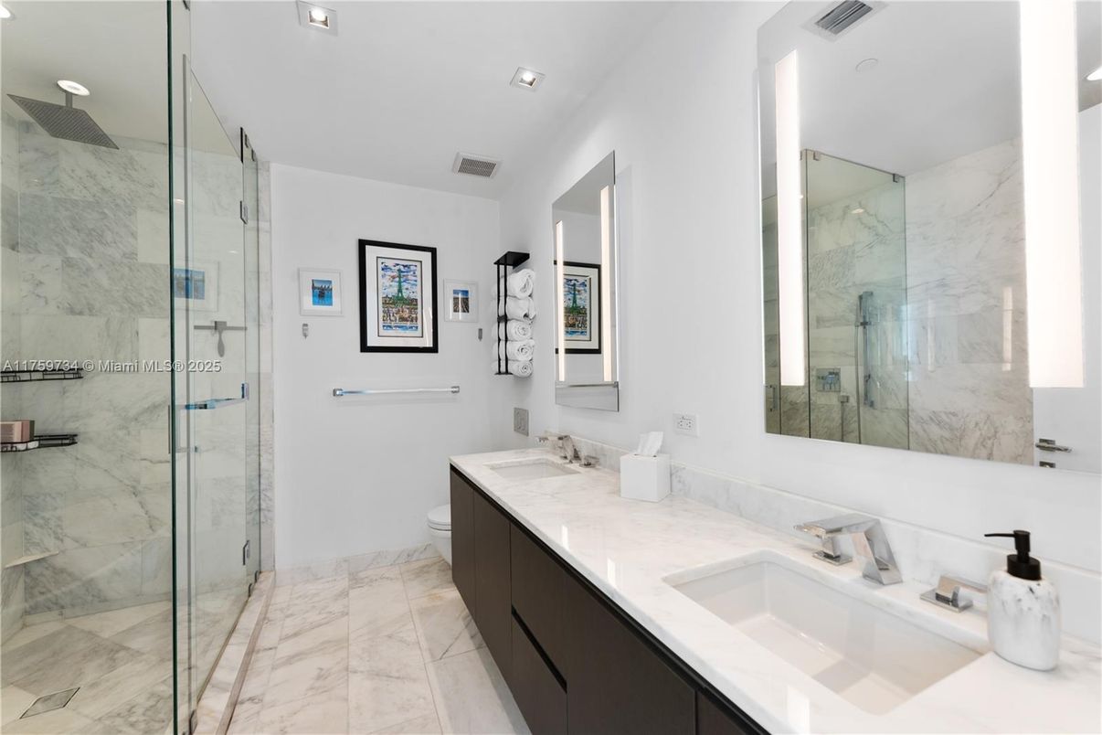 Bathroom, Dual Sink Vanities, Glass Shower, Interior, Marble, Marble Walls, Recessed Lighting