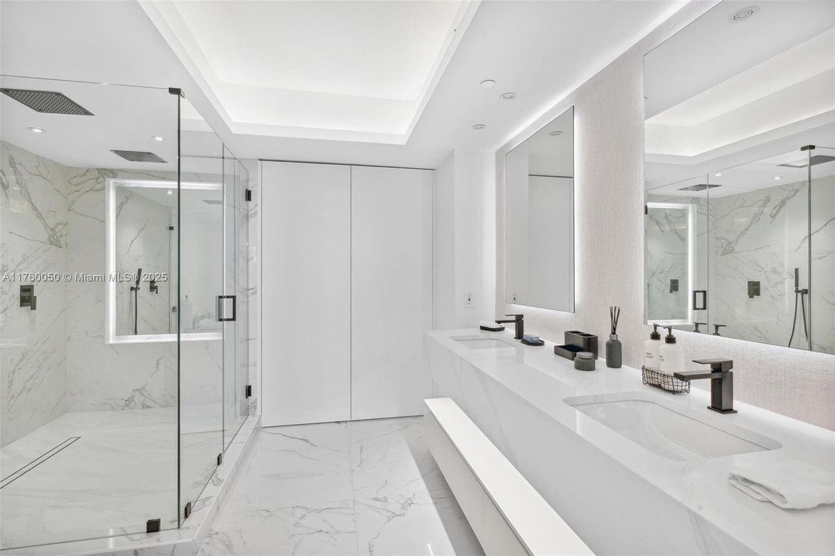 Bathroom, Dual Sink Vanities, Glass Shower, Interior, Marble, Marble Walls, Recessed Lighting