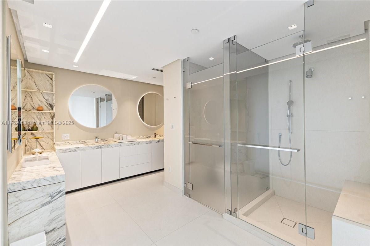 Bathroom, Dual Sink Vanities, Glass Shower, Interior, Marble, Recessed Lighting