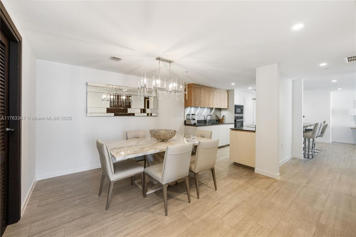 Dining room, Interior, Kitchen, Pendant Lights, Recessed Lighting, Stainless Steel Appliances, Wood Texture Flooring