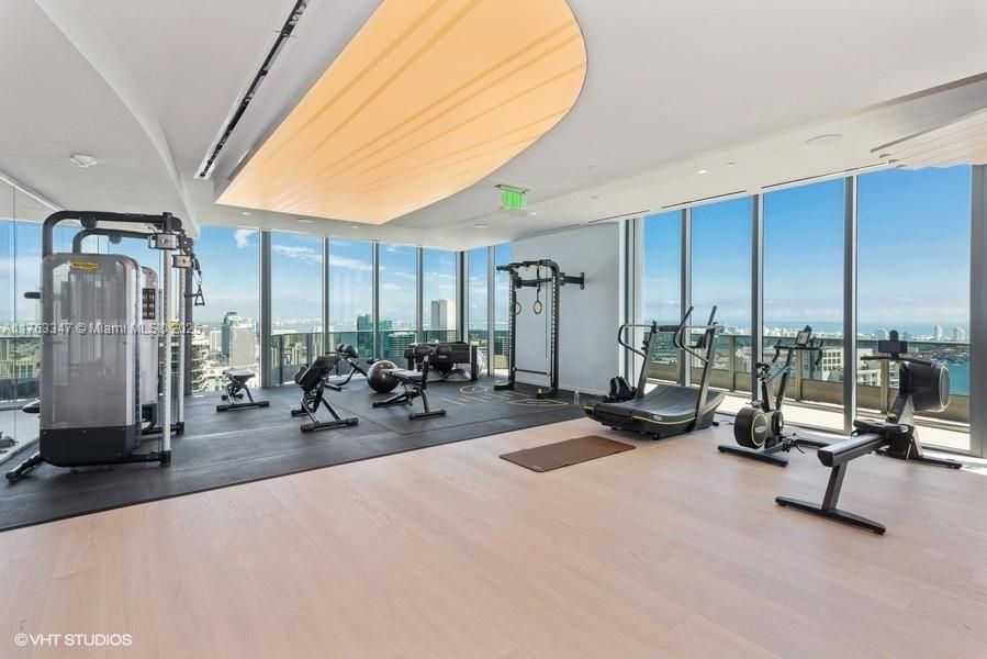 Fitness Equipment, Gym, Interior, Recessed Lighting, Water, Wood Texture Flooring