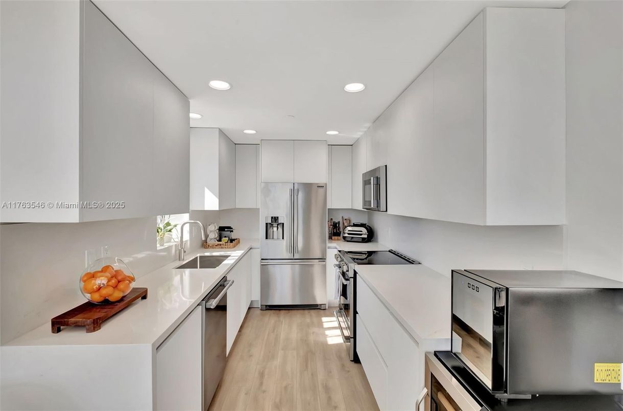 Interior, Kitchen, Recessed Lighting, Stainless Steel Appliances, Wood Texture Flooring