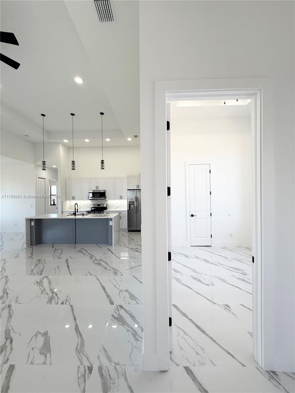 Interior, Kitchen, Marble, Pendant Lights, Recessed Lighting, Stainless Steel Appliances