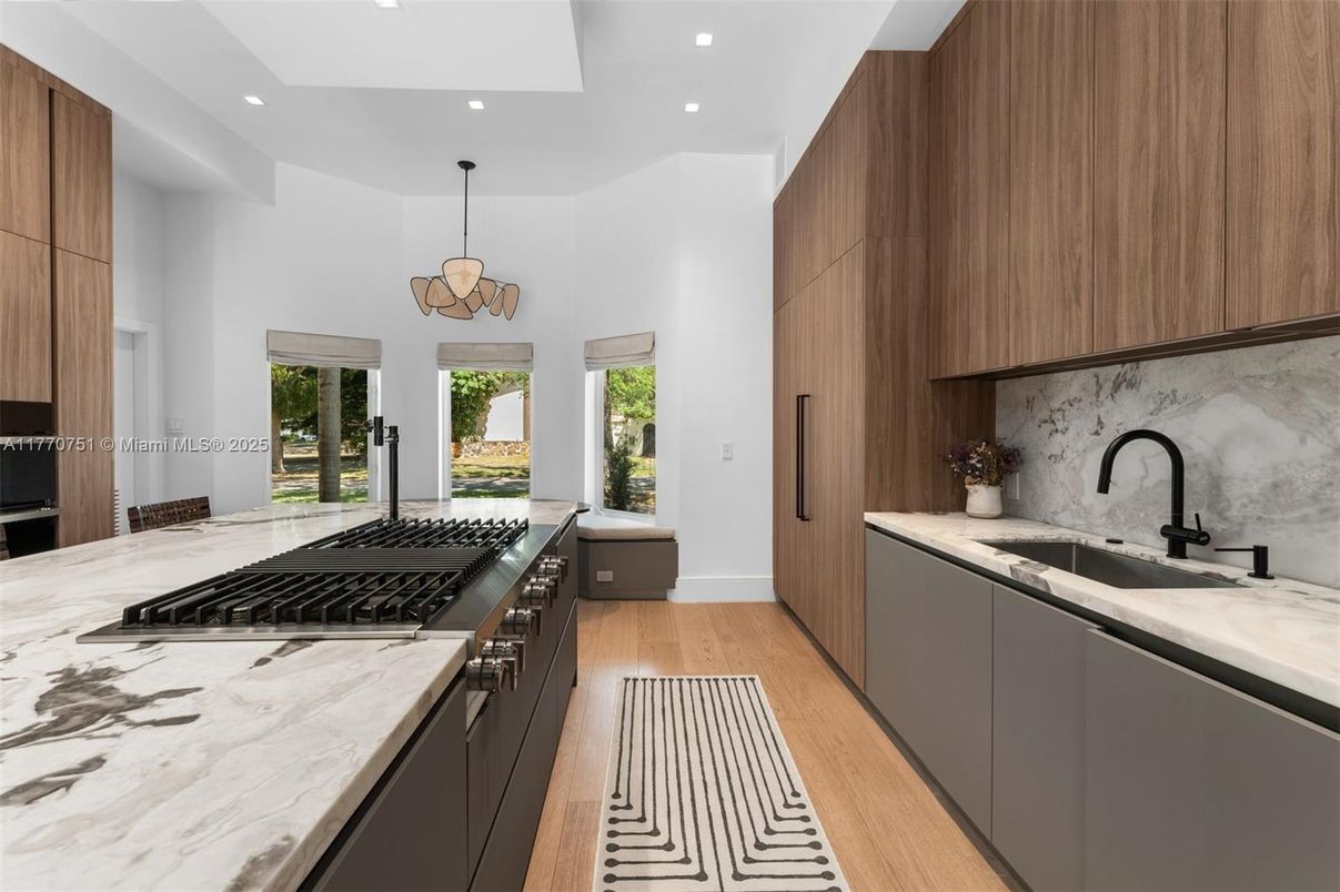Chandelier, Interior, Kitchen, Pendant Lights, Recessed Lighting, Stainless Steel Appliances, Wood Texture Flooring