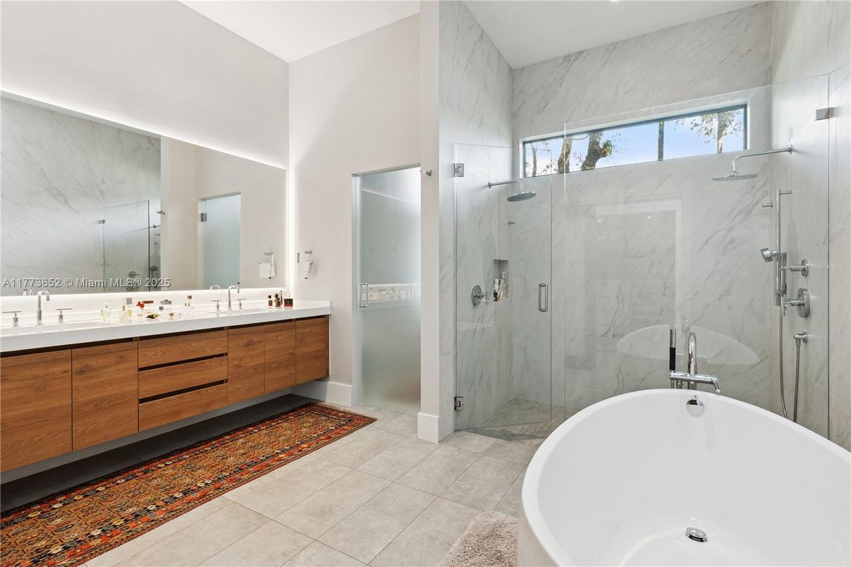 Bathroom, Dual Sink Vanities, Free Standing Baths, Glass Shower, Interior, Marble Walls