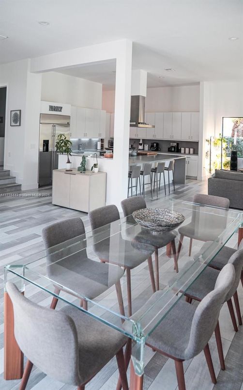 Dining room, Interior, Kitchen, Recessed Lighting, Stainless Steel Appliances, Wood Texture Flooring
